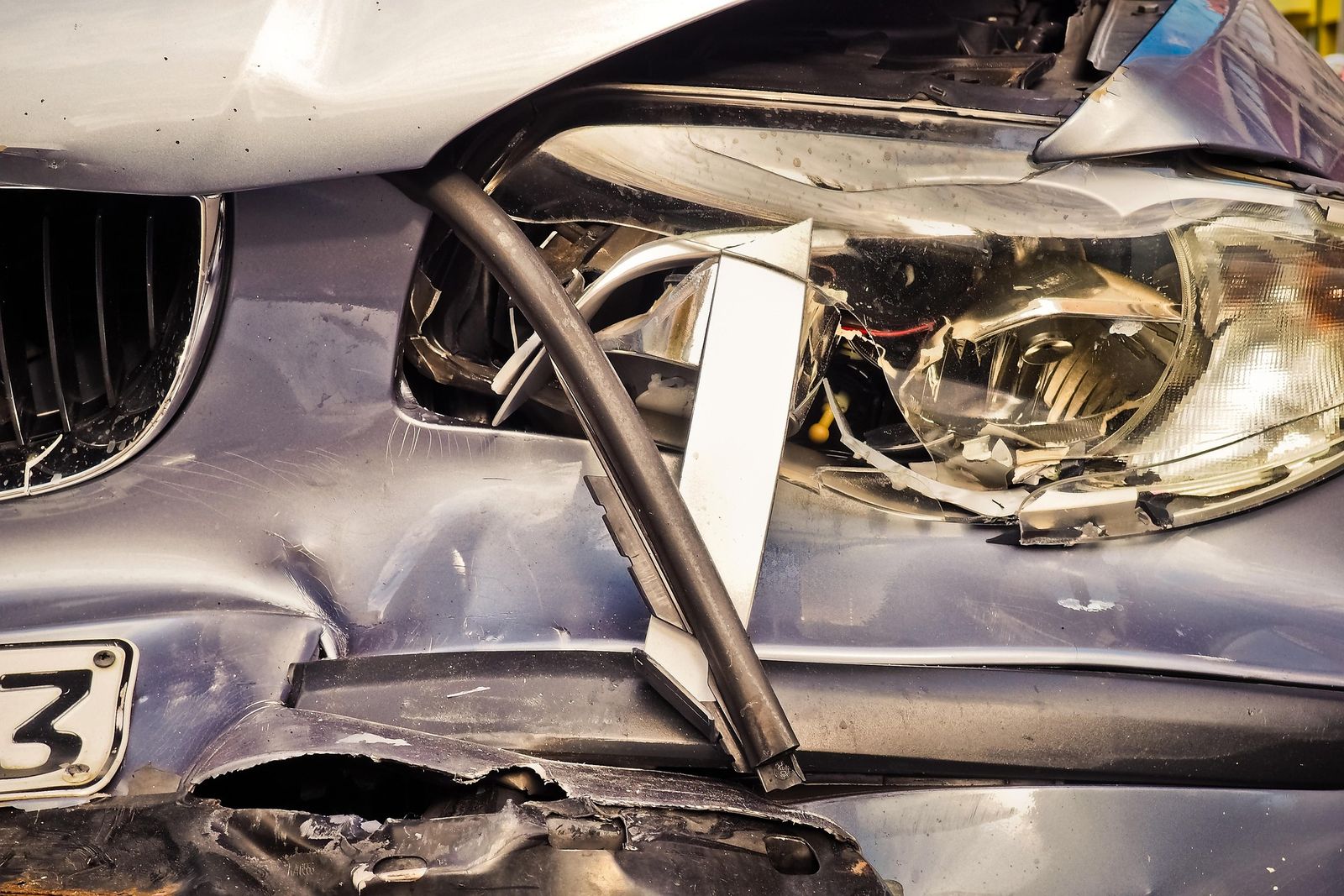 The damaged front end of a car after a collision